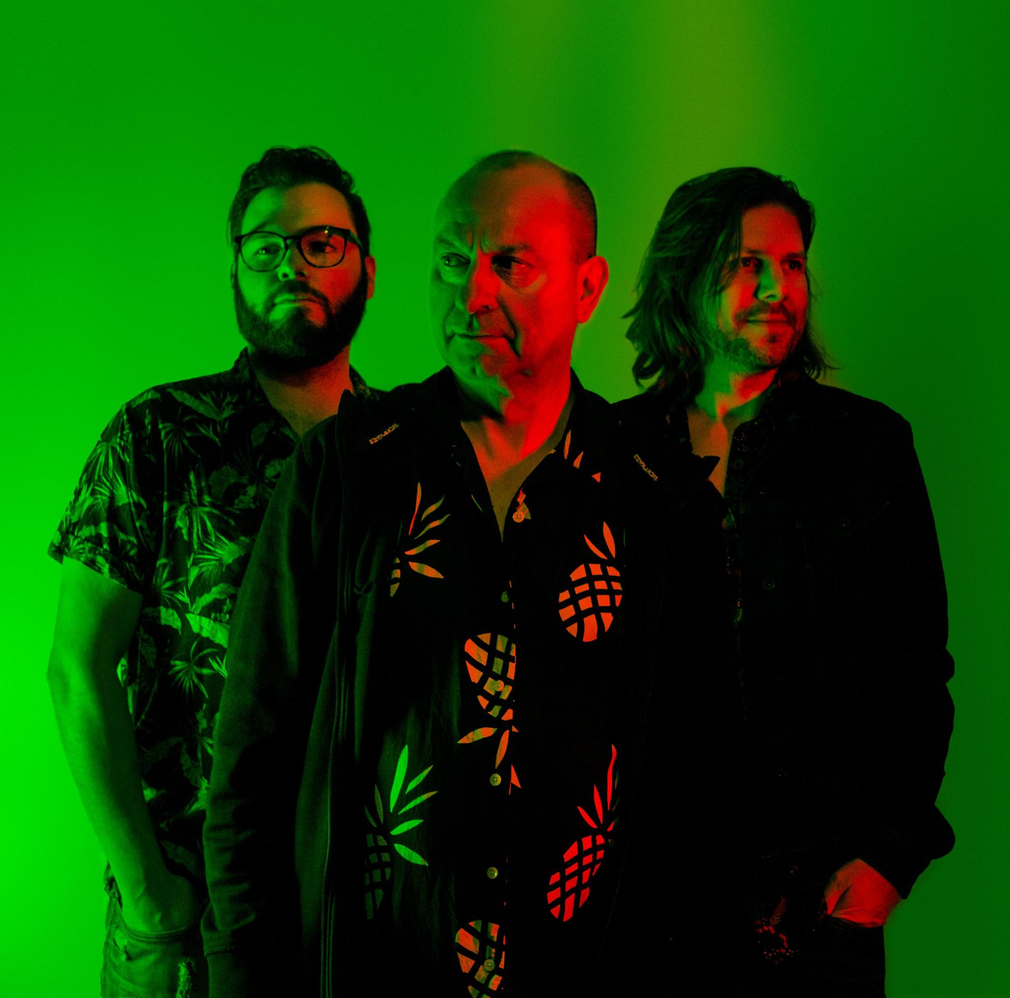 three guys in green